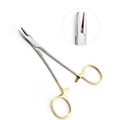 Gold-handled surgical needle holder shown alongside a magnified insert view of its tungsten carbide jaws.